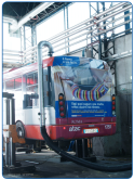 Smoke and exhaust gases extraction in bus garage by retractable pipe connected to a central suction system