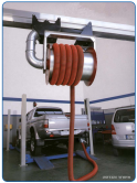 A smoke extraction rectractable pipe on rails for smoke suction from vehicles, trucks and buses