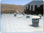 RF-76 rooftop blower installation for ventilation of production halls