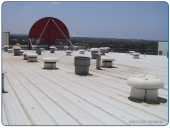 RF-76 rooftop blower installation for ventilation of production halls